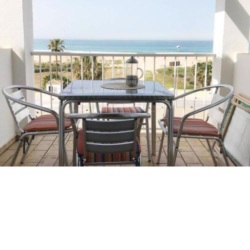Beach apartment & terrace with panoramic sea view.
