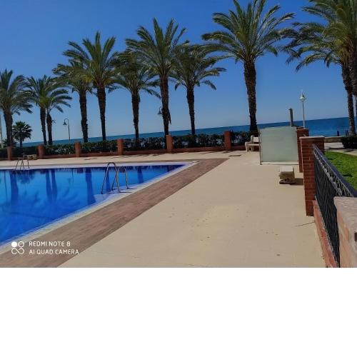 BEACHFRONT APARTMENT in Algarrobo Costa (La Axarquía), next to Torre del Mar