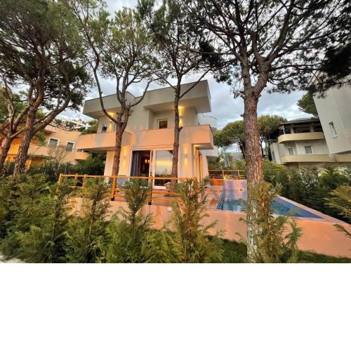 Beachfront villa in Qerret beach with a private pool