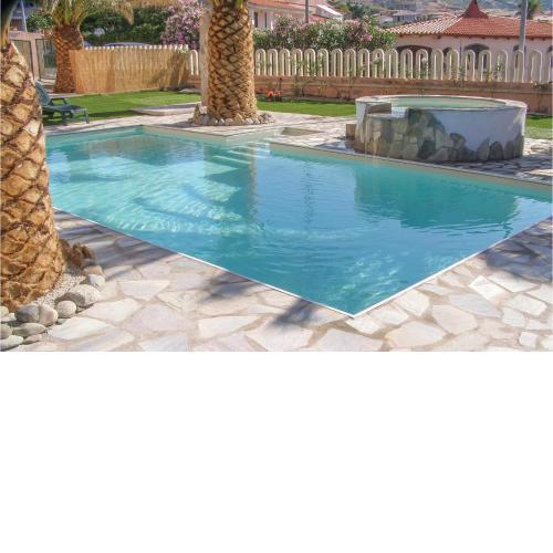 Beautiful apartment in Valledoria with Outdoor swimming pool and 2 Bedrooms