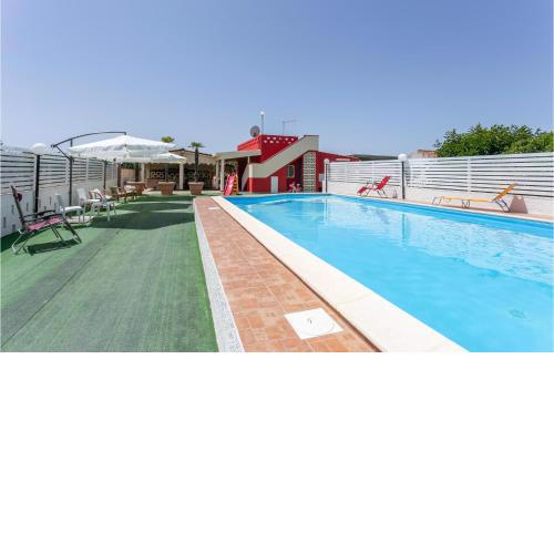 Beautiful home in S, Maria del Focallo with 2 Bedrooms, Outdoor swimming pool and Swimming pool