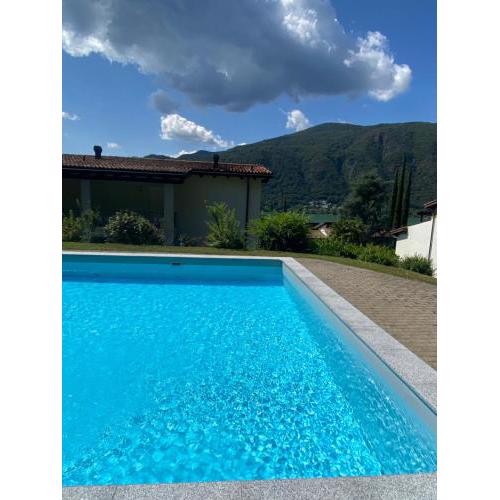 Bellissimo appartamento con giardino sul lago di Lugano