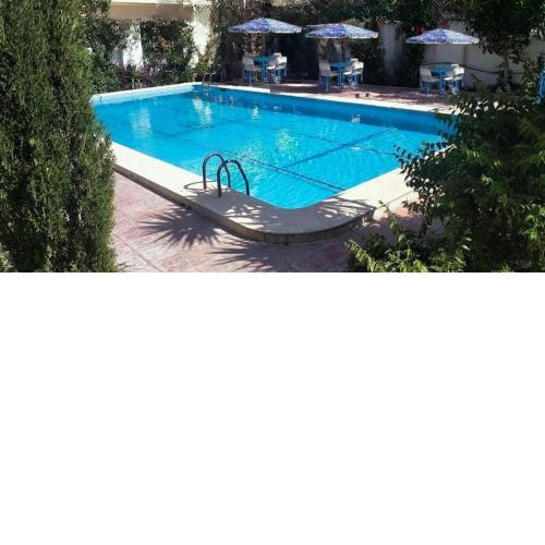 Blue family villa with large private pool