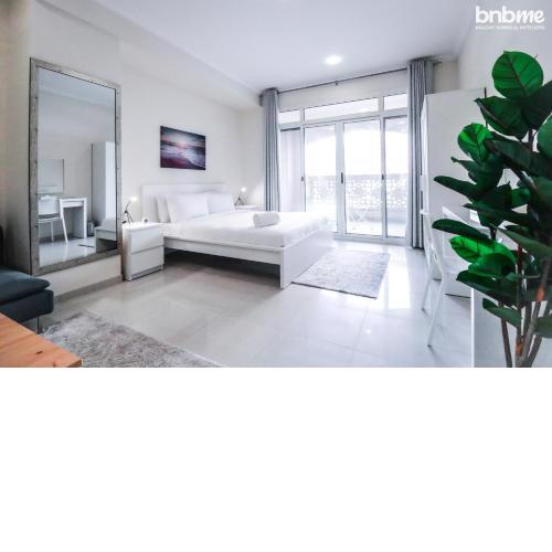 bnbme homes - Stylish Studio Silicon Oasis - 124