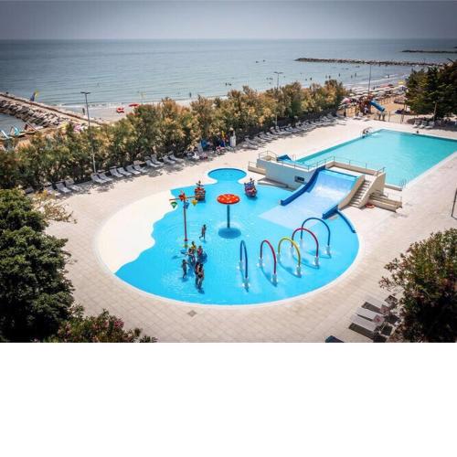 Bungalow in Caorle with garden furniture