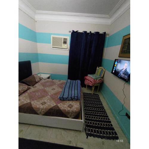 Cairo Gem budget room with AC and smart TV, 12minutes from the airport please only book through booking we can't offer booking outside the app, please contact us via phone number provided after confirming your booking, so we can check you in, thanks