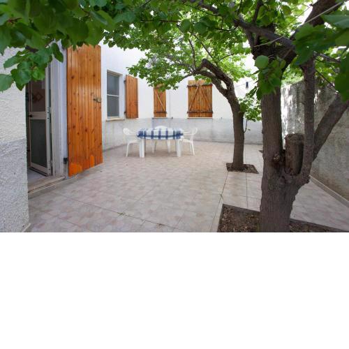 Casa con giardino
