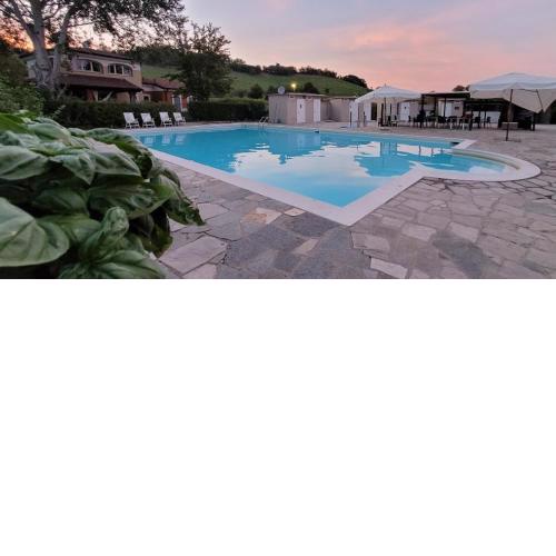 CASA DI GIULIA_cucina, camera con tetto a vista, piscina e free wi-fi