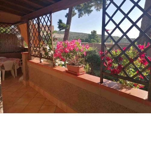 Casa fiorita a Cugnana