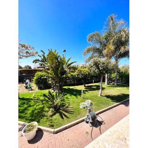 Casa Merlino Tra Terra e Mare - appartamento in Villa - Ricarica auto elettriche
