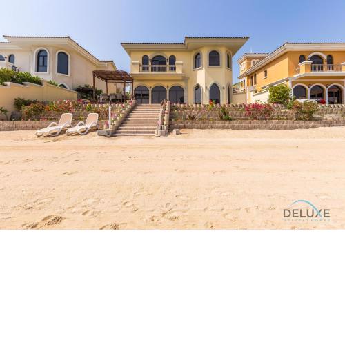Charming 5BR Villa with Assistant's Room and Private Pool on Palm Jumeirah by Deluxe Holiday Homes