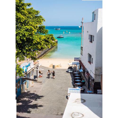 Chic Studio with Sea Views & Wifi in Heart of Corralejo by Holidays Home