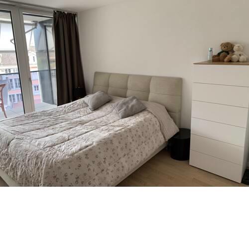 City room with shared bathroom
