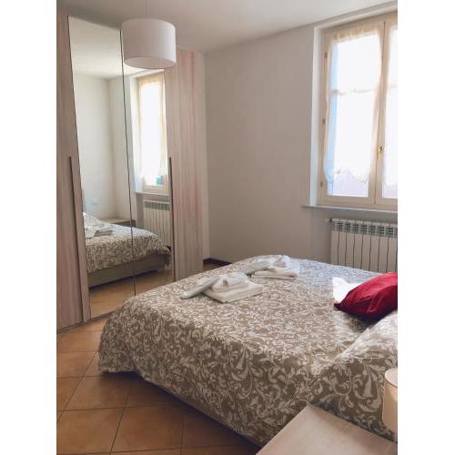 "Coccole nel borgo" 2min to outlet apartment with terrace