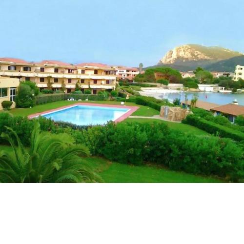 Cosy holiday home in Marinella with shared pool