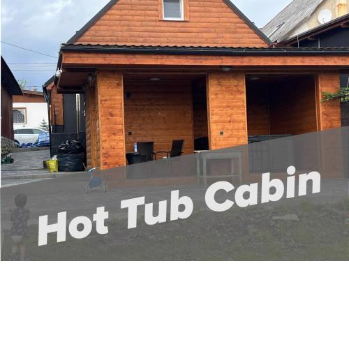 Cottage with a hot tub