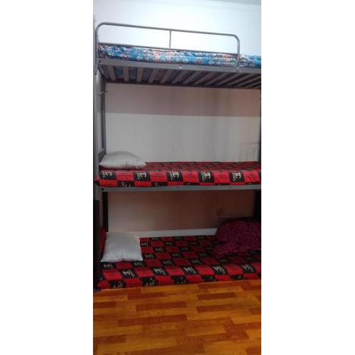 Dormitory bed space in a shared room