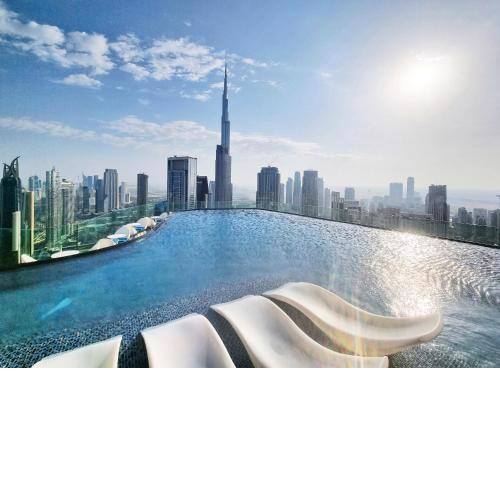 Downtown's Highest Pool & Full 5-Star Hotel Luxury with Gym, Spa and Restaurants