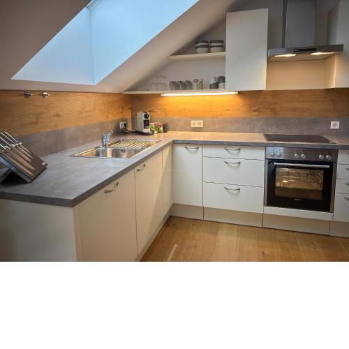 "EIGHT" Premium Apartments Seekirchen, charmante 3-Zi-Dachgeschoss-Wohnung mit Balkon