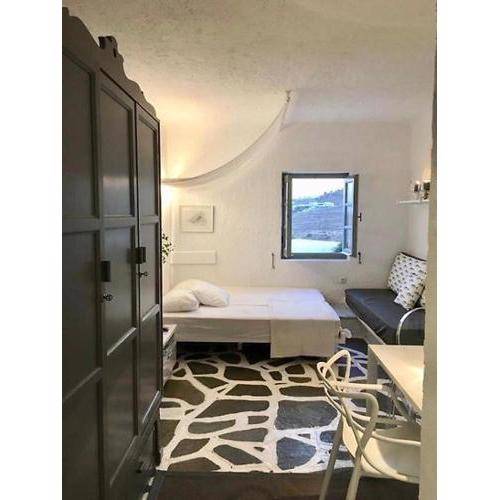 Elegant studio with pool and private beach.