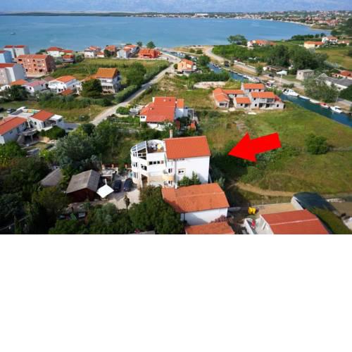 Family friendly apartments with a swimming pool Nin (Zadar) - 5858
