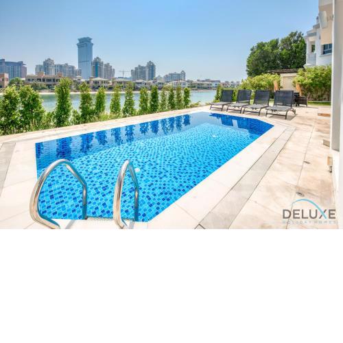 Fanciful 6BR Villa with Assistant Room at Frond B Palm Jumeirah by Deluxe Holiday Homes