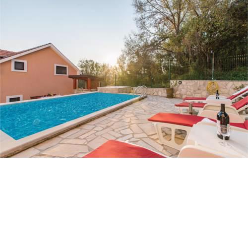 Four-Bedroom Holiday Home in Igalo