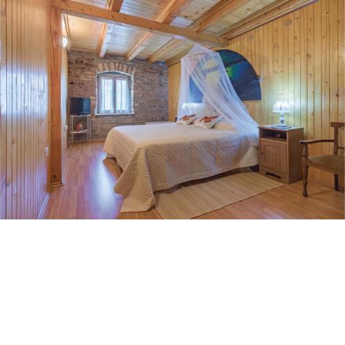 Four-Bedroom Holiday Home in Jural