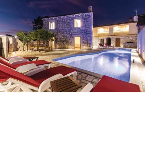 Four-Bedroom Holiday Home in Marcana