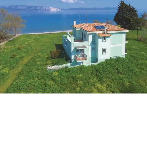 Four-Bedroom Holiday Home in Pefki