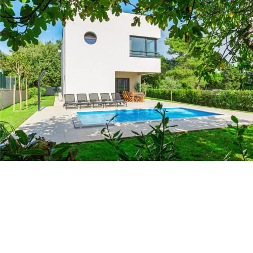 Four-Bedroom Holiday Home in Premantura