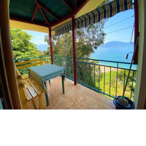 Fourth Room of Cozy Beachside Haven - Panoramic Radhime Retreat with Balcony Dining