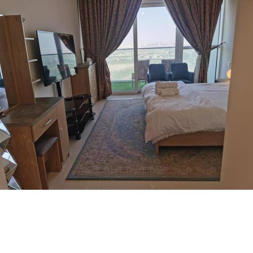 Gharfar-2 Heaven Escape-Golf view-high floor-Netflix-GYM-Pool-perfect staycation