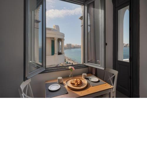 grey l studio apartments Corniche Alexandria Little Venice