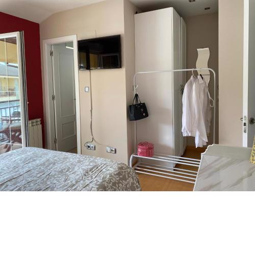 Habitación con baño privado en casa del Anfitrión