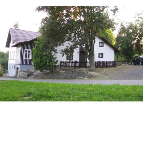 Holiday home in a quiet authentic mountain village with a view of the surrounding hills