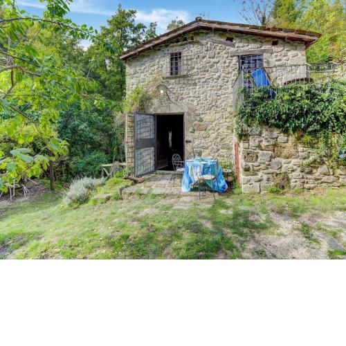 Holiday home in a water mill next to a waterfall and natural swimming pond