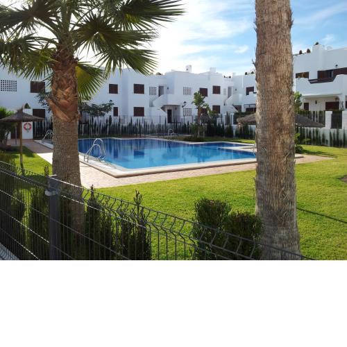 Homes of Spain, Mar de Pulpi fase 1, Apartamento primera linea de playa, bajo con jardin y WIFI