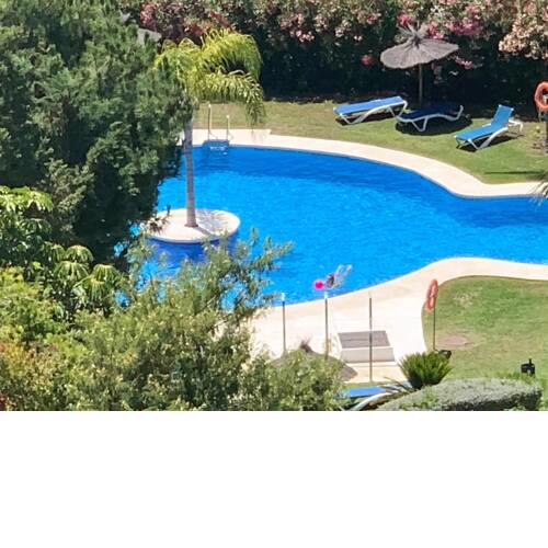House with 2 bedrooms in Malaga with wonderful sea view shared pool furnished terrace 2 km from the beach