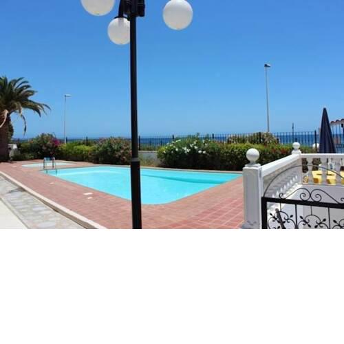 House with 2 bedrooms in San Bartolome de Tirajana with wonderful sea view shared pool and enclosed garden 300 m from the beach