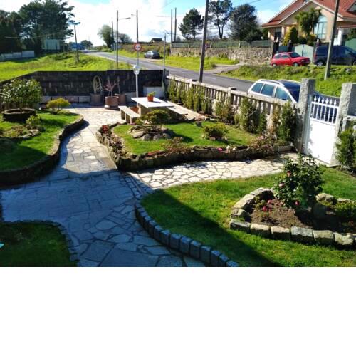 House with 3 bedrooms in Camposancos with wonderful mountain view furnished garden and WiFi 200 m from the beach