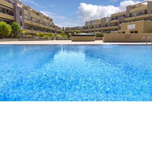 La Perla Beach Apt with Pool
