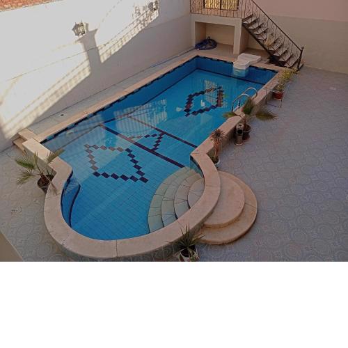 Lägenhet i villa med pool i Hurghada-Magawish
