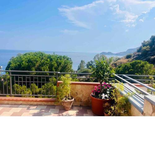 Letojanni, roof terrace, views of sea and Toarmina