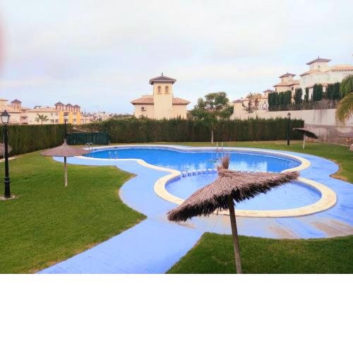 Lomas de Cabo Roig Top floor apartment with private roof Solarium Airport Runs Included