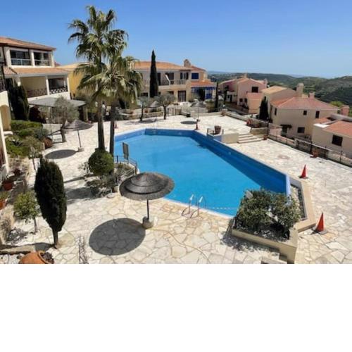 Lovely two bedroom apartment in Tsada, Paphos with Pool and Sea Views