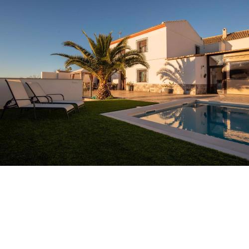 Lujoso chalet en el centro de Andalucía Con barbacoa y chimenea exterior