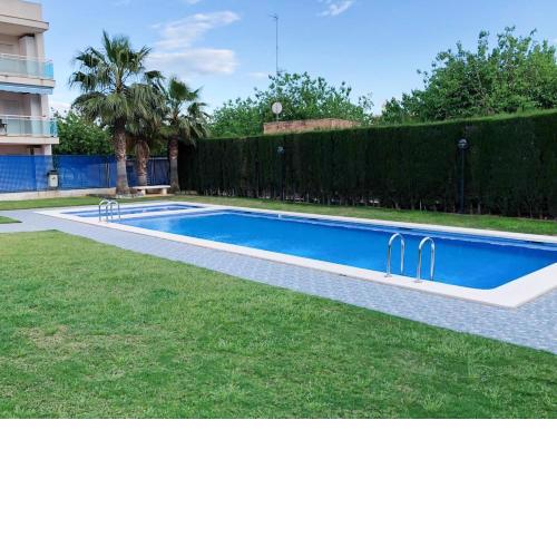 Luminoso apartamento con piscina en Playa Morro de Gos