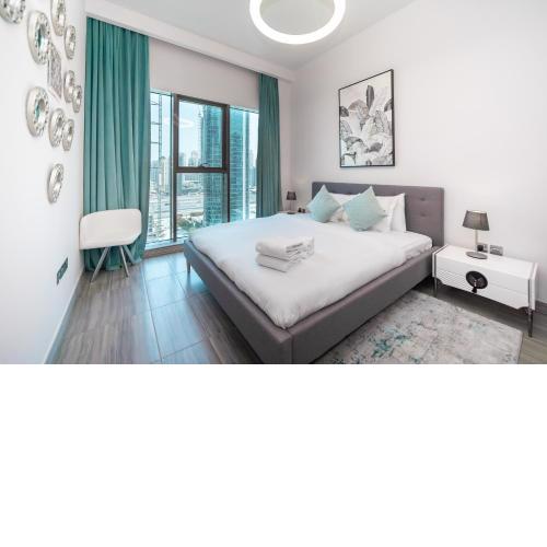 Luton Vacation Homes - Modern & Lake view 1BR , MBL Residence, Jumeirah Lake Towers
