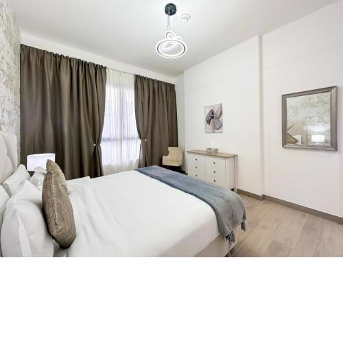 Luton Vacation Homes - Modern & Sea View 1BR, Le Pont Tower, La Mer - Dubai